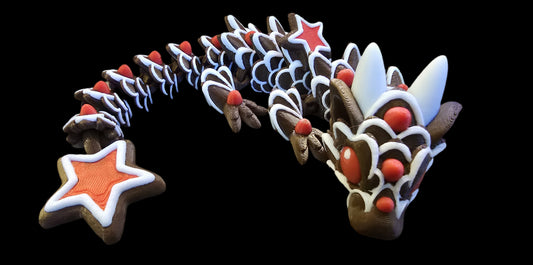 Decorative cookie sculpture shaped like a dragon on a black background