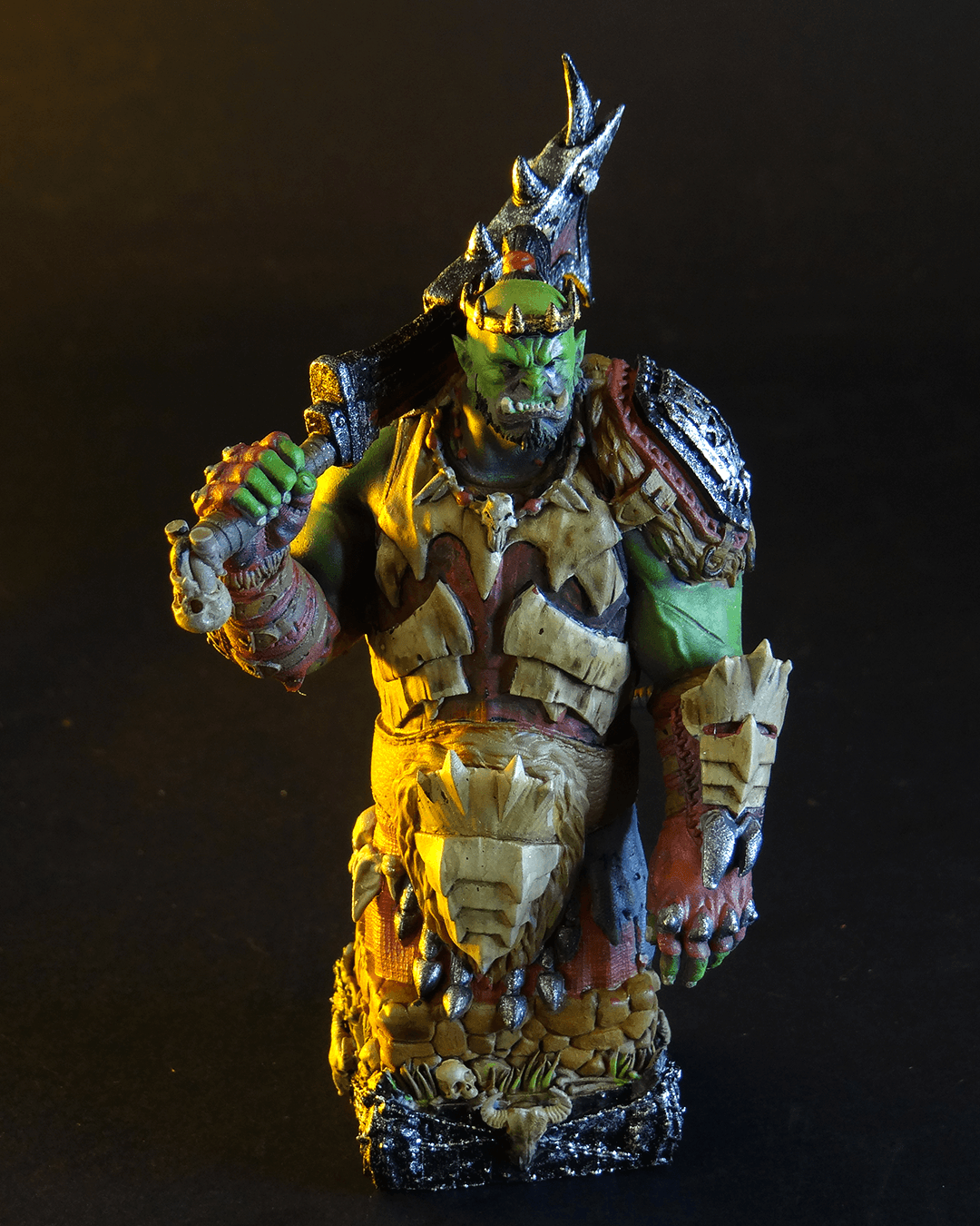 Colorful fantasy figurine with detailed armor and helmet on a dark background