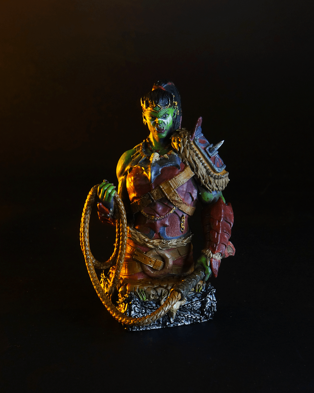 Colorful fantasy figurine with a dark background