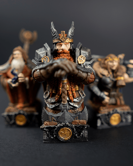 Detailed figurine of a bearded warrior with armor and helmet, standing in front of two other figures on a dark background.