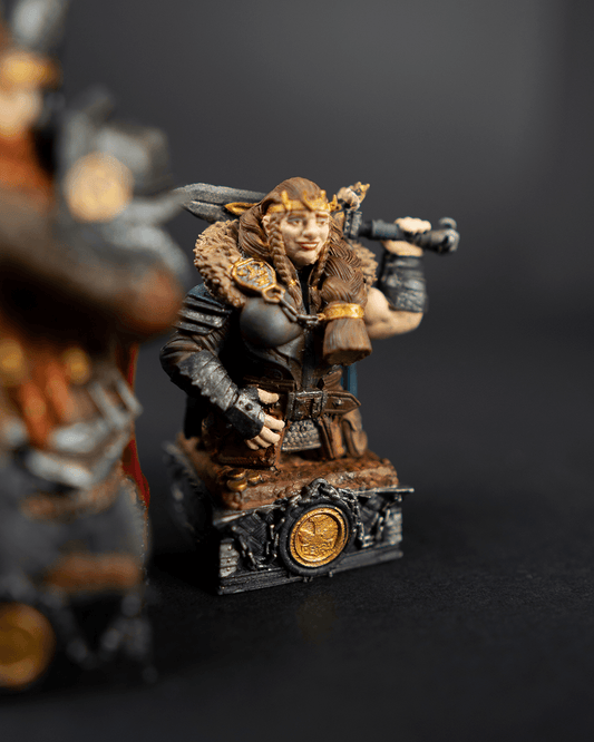 Miniature figurine of a warrior in ornate armor with a dark background