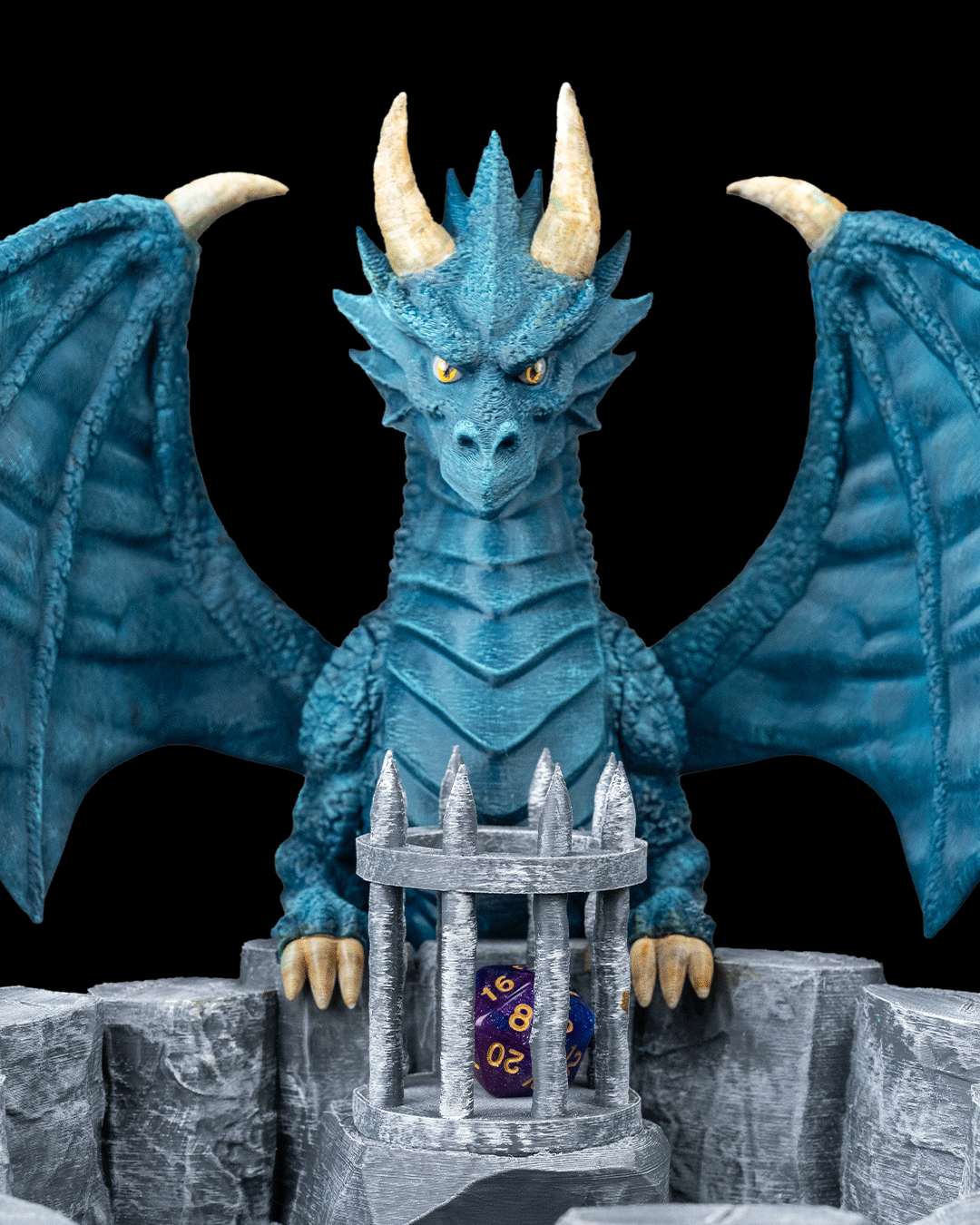 Blue dragon figurine with wings and a castle-like structure on a black background