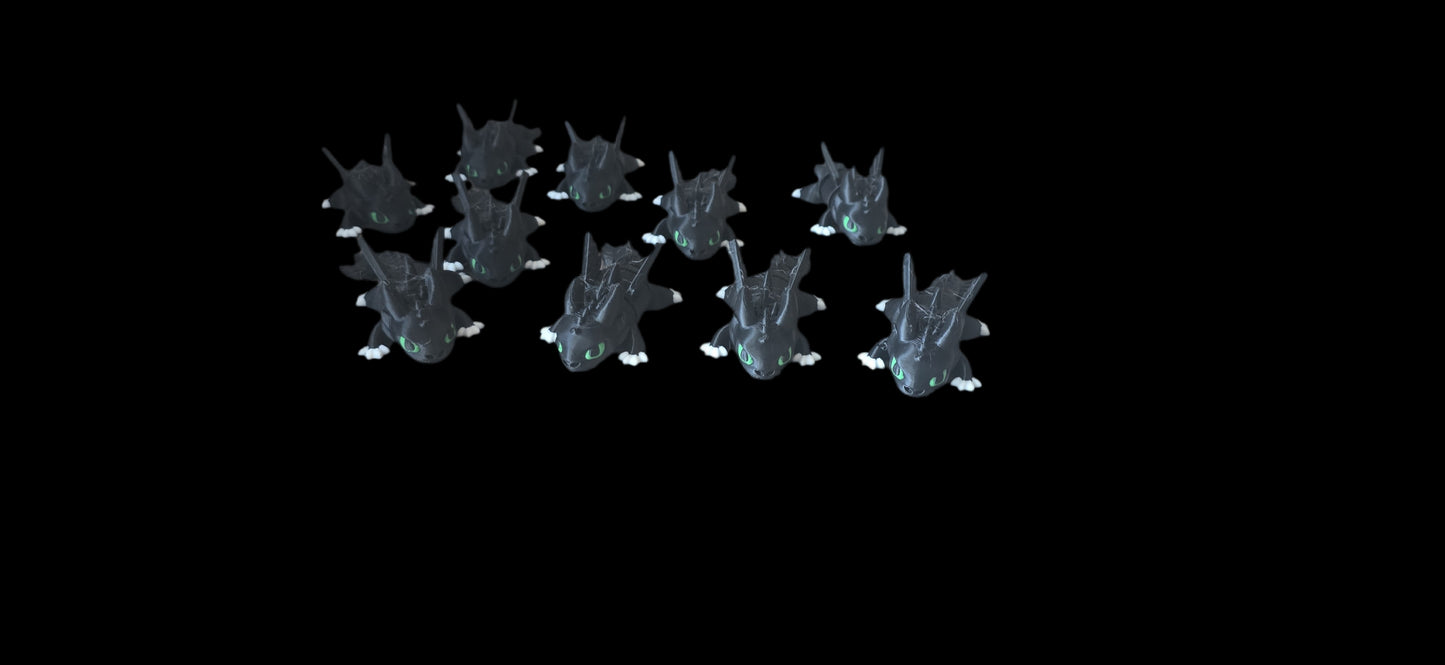 Row of small baby dragons on a black background