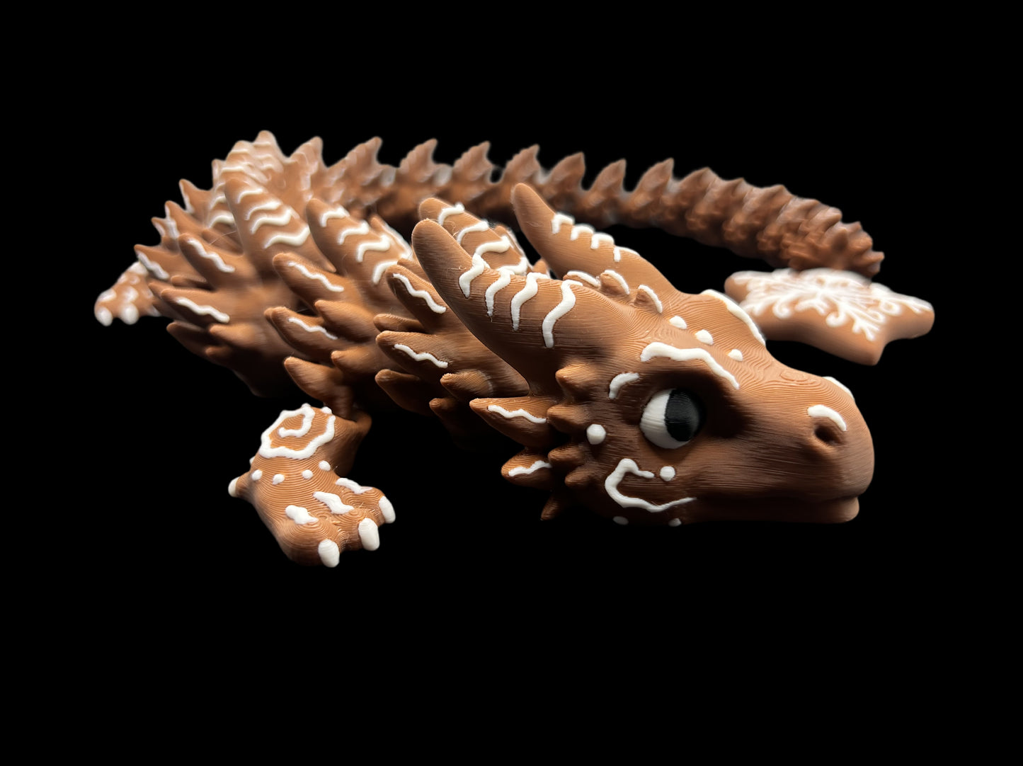 Brown dragon-like creature with white accents on a black background